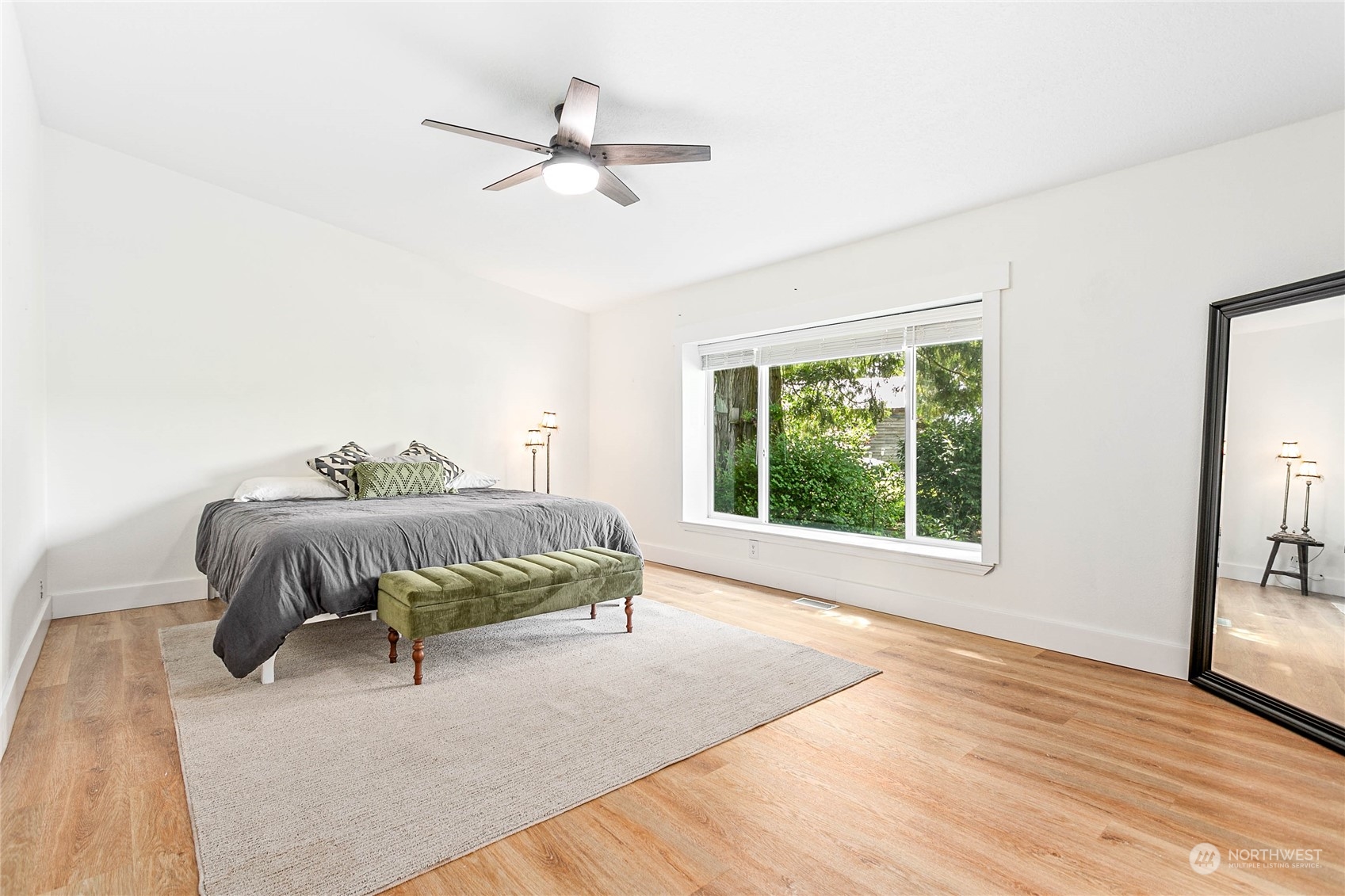 8338 Bob Hall Road Lynden, WA 98264 - Photo 14 of 37 a bedroom with a bed and window