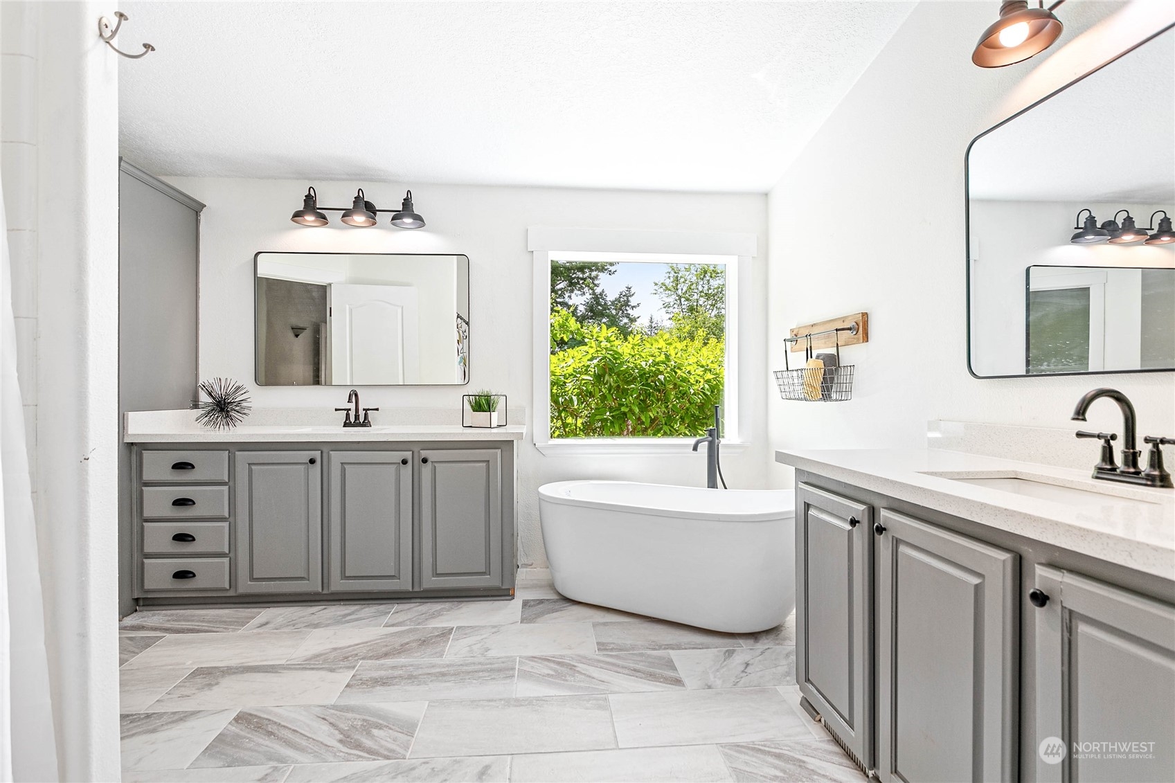 8338 Bob Hall Road Lynden, WA 98264 - Photo 15 of 37 a bathroom with a sink and a mirror