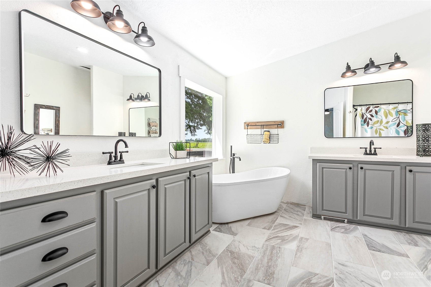 8338 Bob Hall Road Lynden, WA 98264 - Photo 16 of 37 a bathroom with a sink vanity tub and mirror