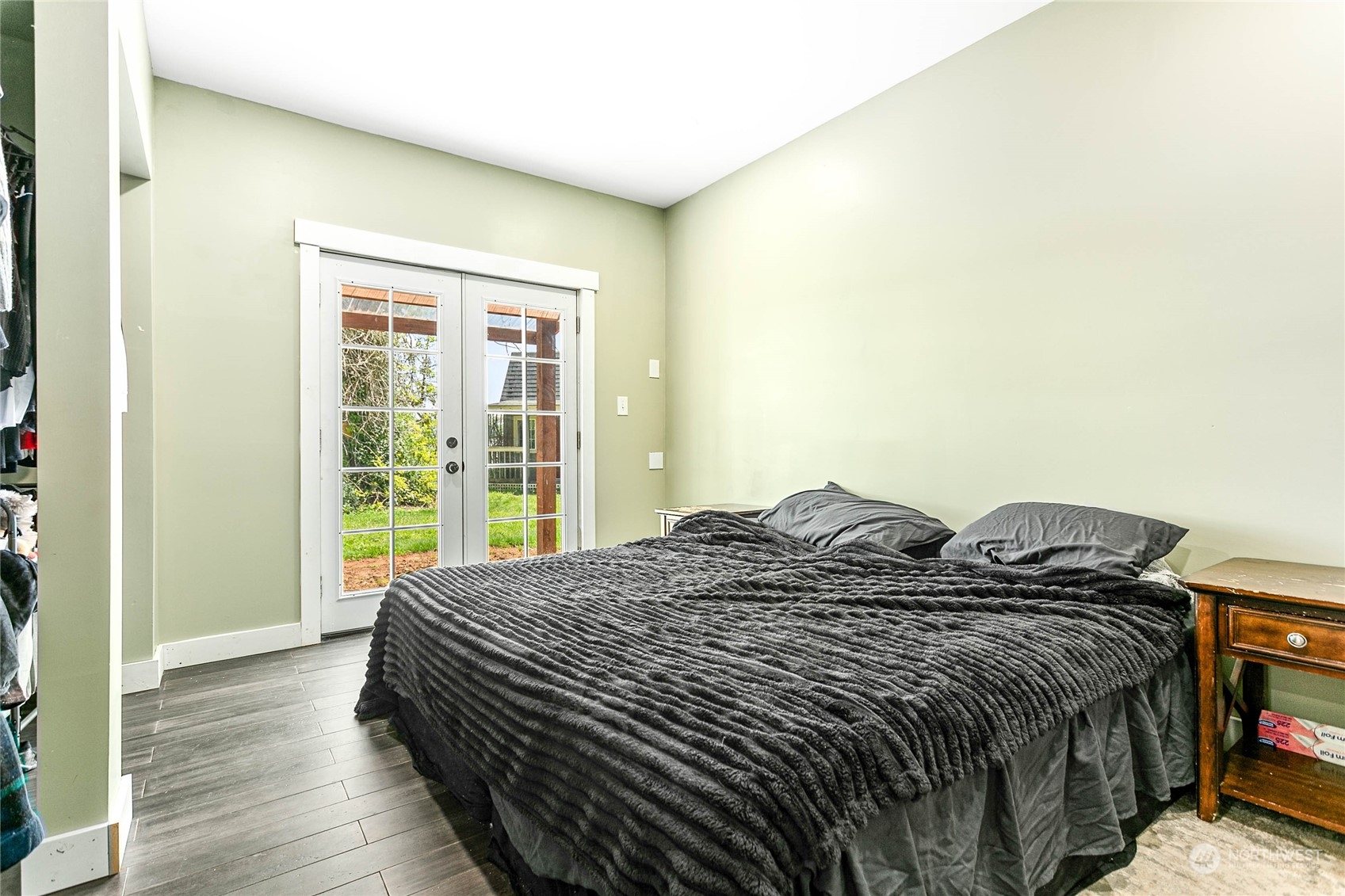 8338 Bob Hall Road Lynden, WA 98264 - Photo 23 of 37 a bed sitting in a bedroom next to a window