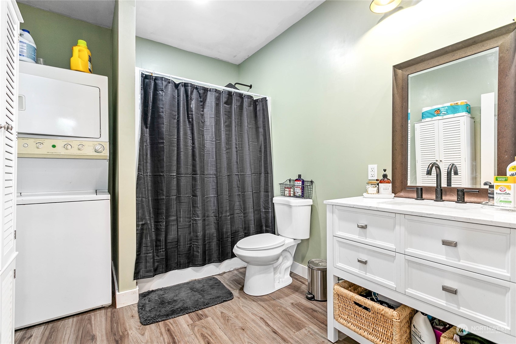 8338 Bob Hall Road Lynden, WA 98264 - Photo 24 of 37 a bathroom with a sink a toilet and shower