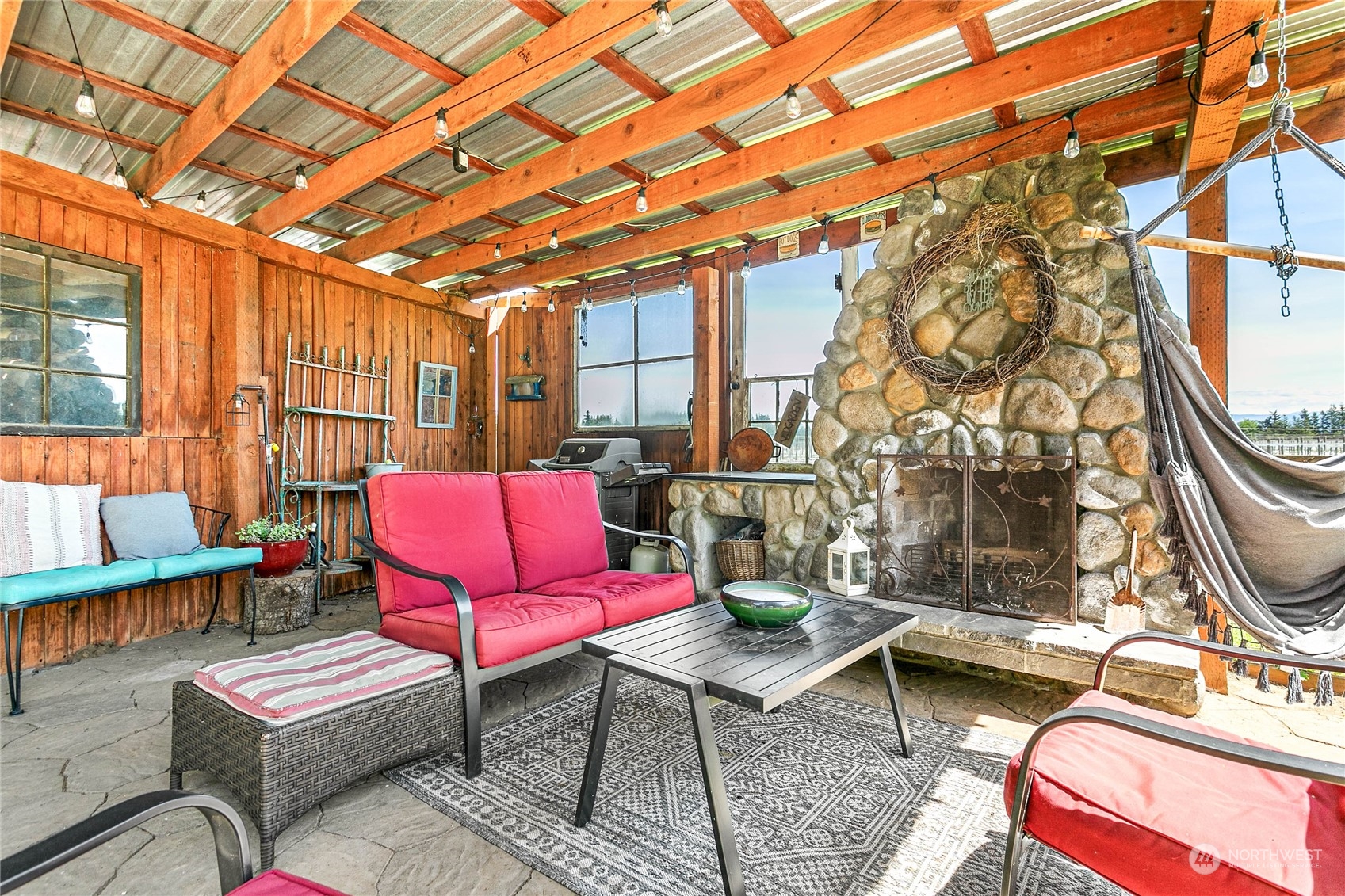 8338 Bob Hall Road Lynden, WA 98264 - Photo 25 of 37 a outdoor living space with patio furniture