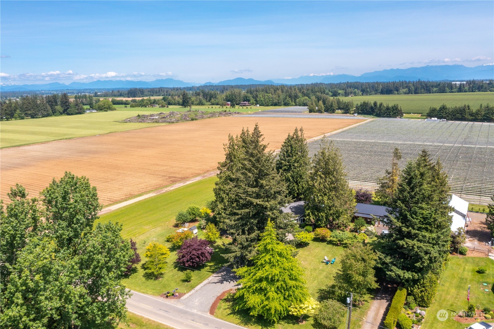 8338 Bob Hall Road Lynden, WA 98264 - Photo 32 of 37 a view of an outdoor space and a lake view