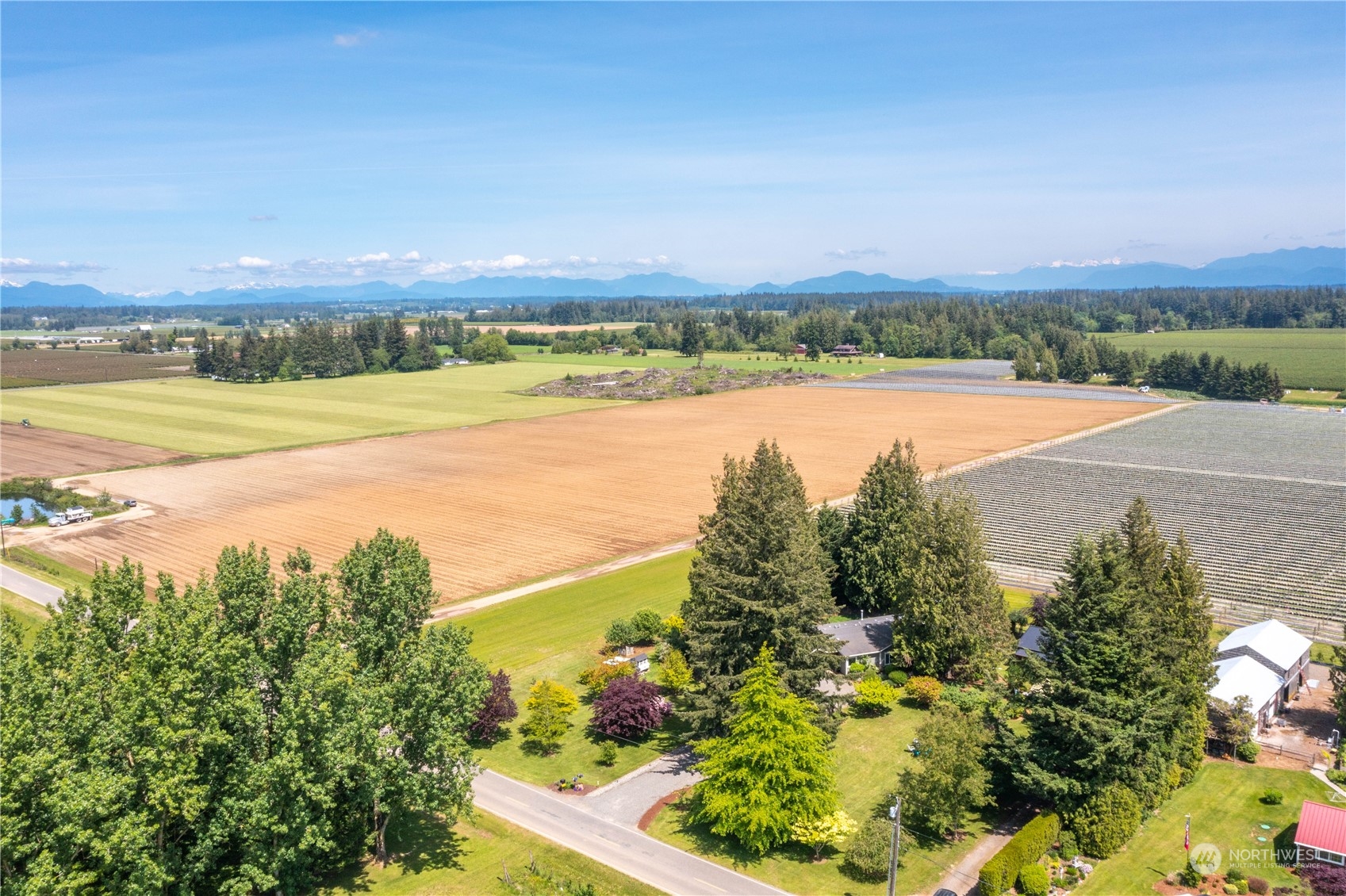 8338 Bob Hall Road Lynden, WA 98264 - Photo 33 of 37 a view of a city and an ocean view