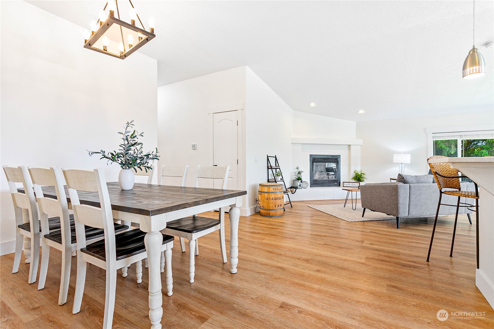 8338 Bob Hall Road Lynden, WA 98264 - Photo 6 of 37 a view of a dining room with furniture and wooden floor