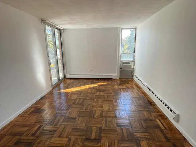 a view of an empty room and window
