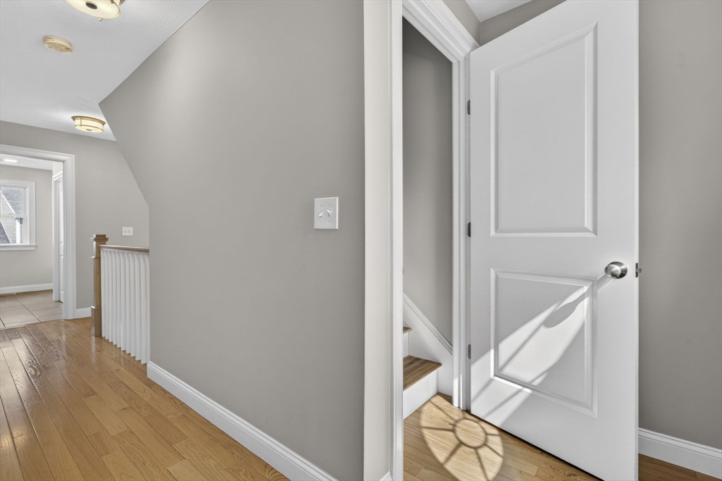 129 Acton Street, Unit 16 Maynard, MA 01754 - Photo 31 of 41 a view of a hallway with staircase