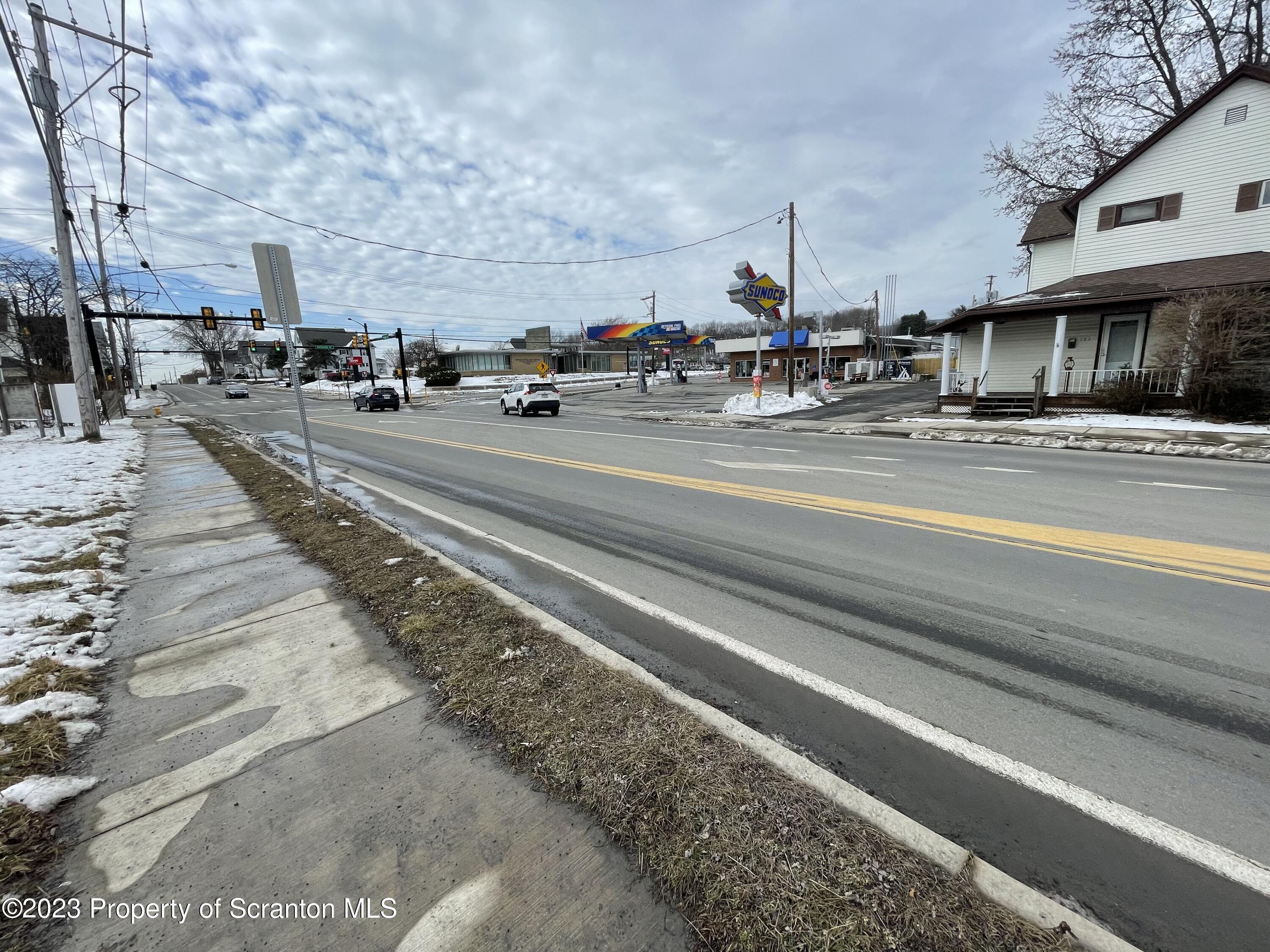 229 Main Street Archbald, PA 18403 - Photo 4 of 13 a view of street with cars