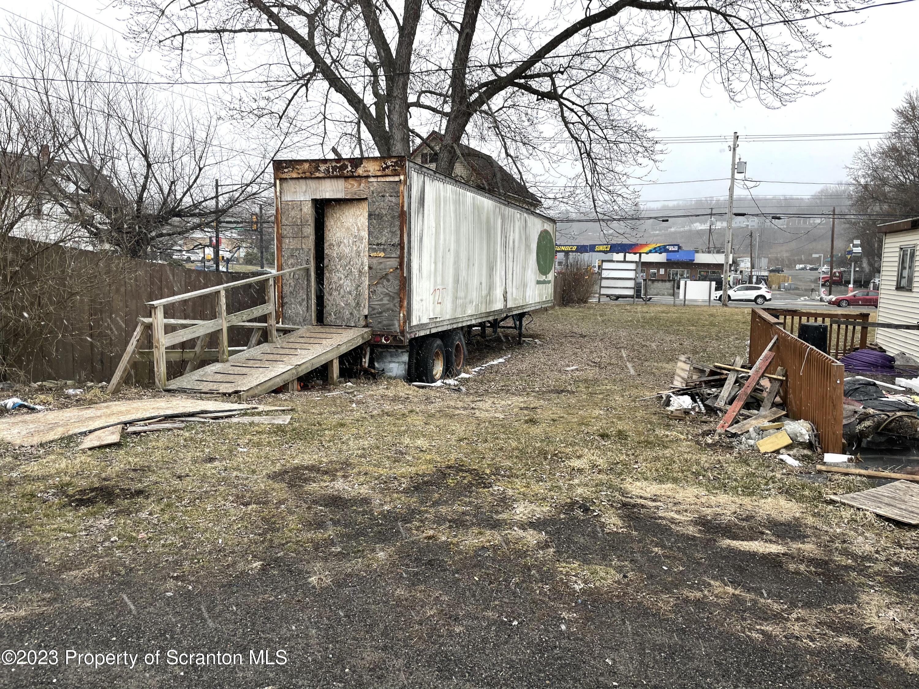 229 Main Street Archbald, PA 18403 - Photo 7 of 13 a view of a house with backyard