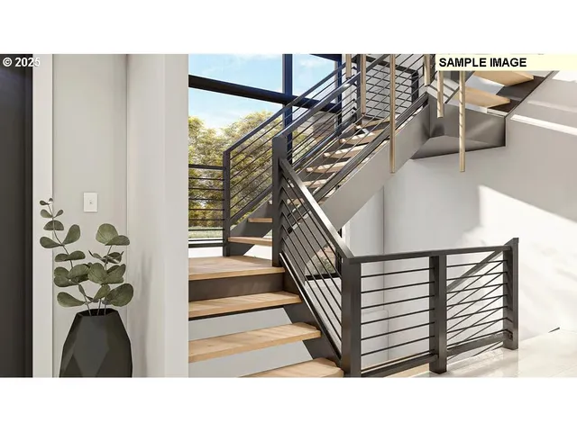 a black and white photo of a living room