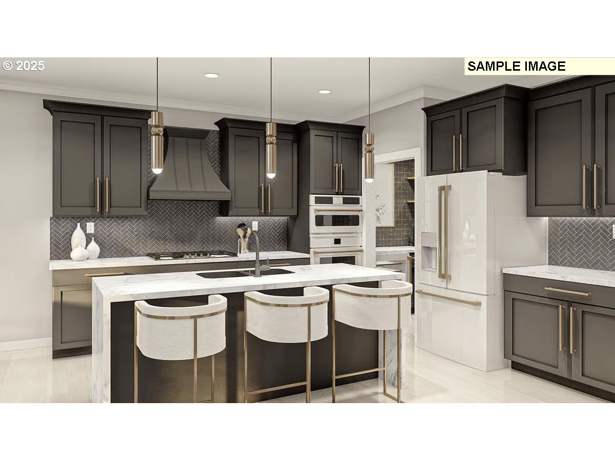 600 Northwest Halifax Street, Unit LOT 16 Camas, WA 98607 - Photo 9 of 18 a kitchen with a sink a refrigerator and chairs