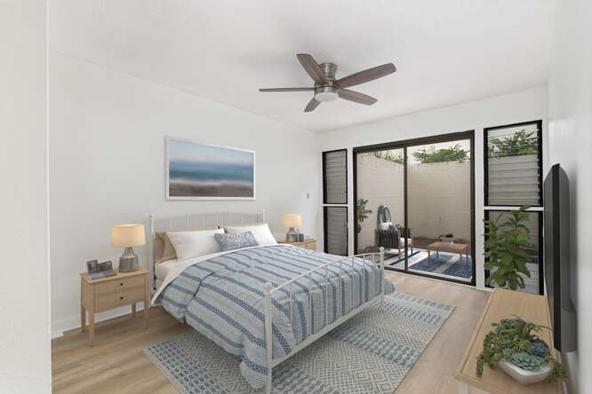 79-7199 Mamalahoa Highway, Unit 110 Holualoa, HI 96725 - Photo 12 of 26 a bedroom with a large bed and a chandelier