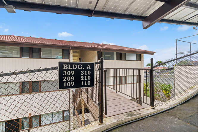 79-7199 Mamalahoa Highway, Unit 110 Holualoa, HI 96725 - Photo 22 of 26 a view of a house with wooden deck