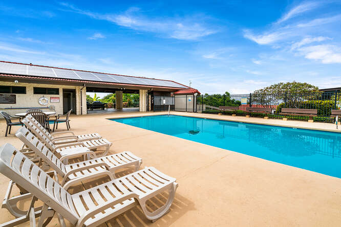 79-7199 Mamalahoa Highway, Unit 110 Holualoa, HI 96725 - Photo 25 of 26 a view of a house with swimming pool and sitting area