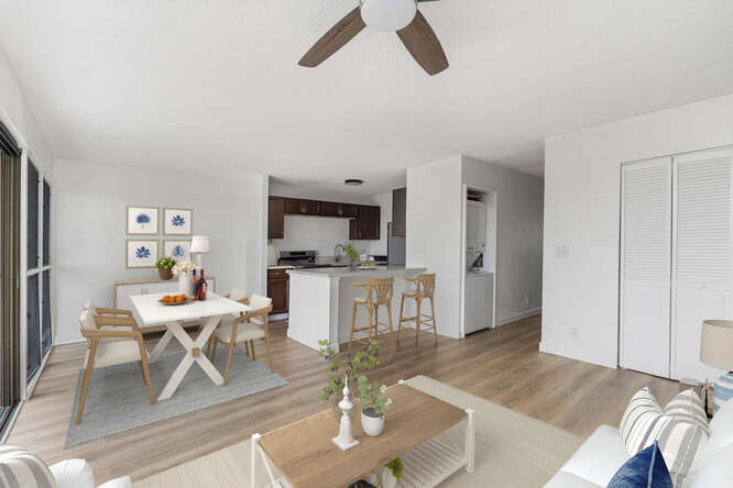 79-7199 Mamalahoa Highway, Unit 110 Holualoa, HI 96725 - Photo 3 of 26 a living room with furniture and a flat screen tv