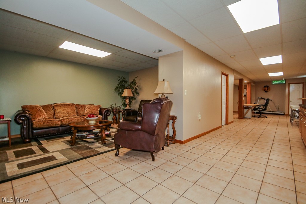 1966 Spring Grove Madison, OH 44057 - Photo 39 of 50 Virtually all spaces within this full basement have been finished greatly enlarging its finished square footage