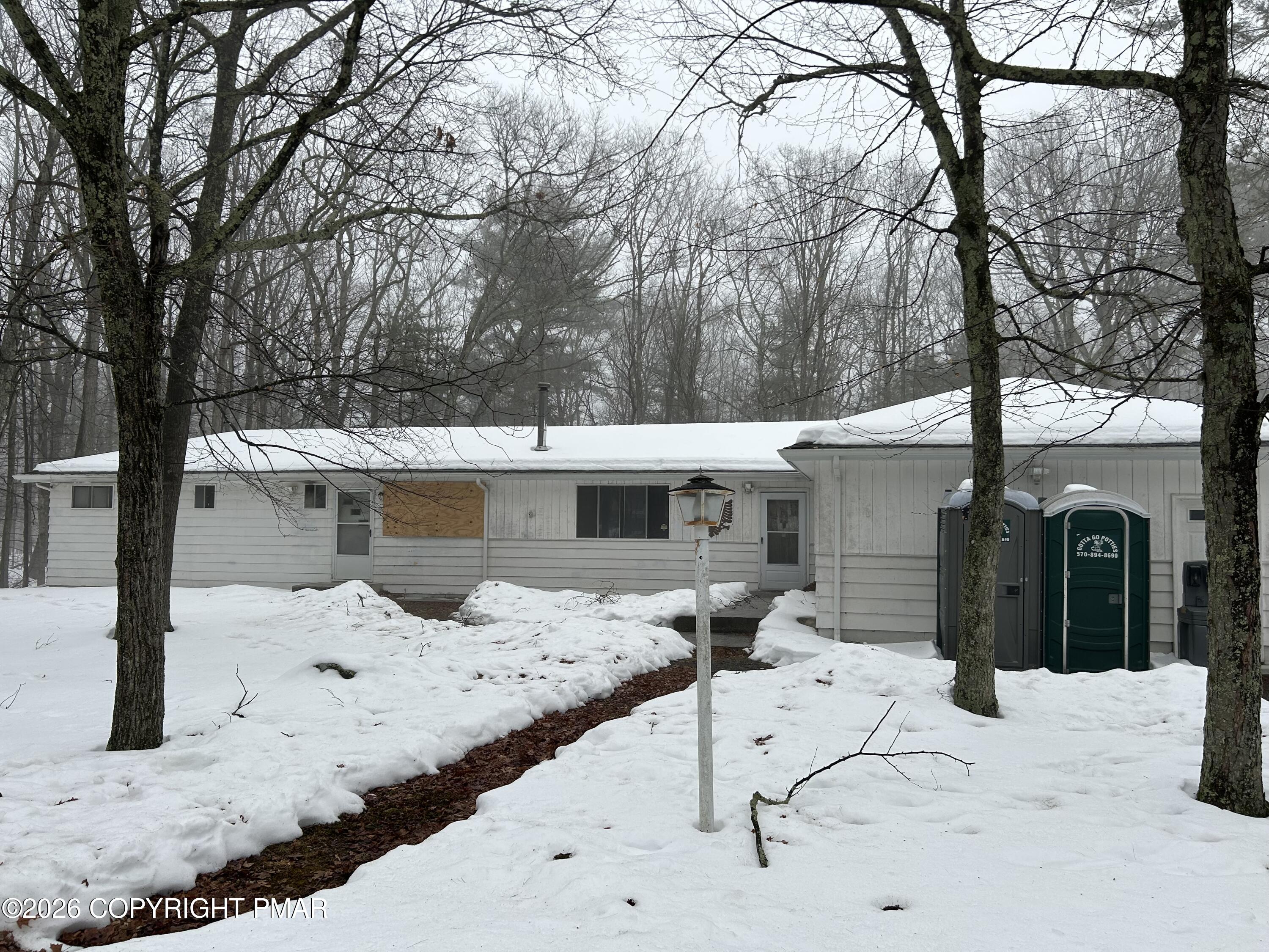 106 Dogwood Road Dingmans Ferry, PA 18328 - Photo 34 of 34 a view of a lounge chair on the road