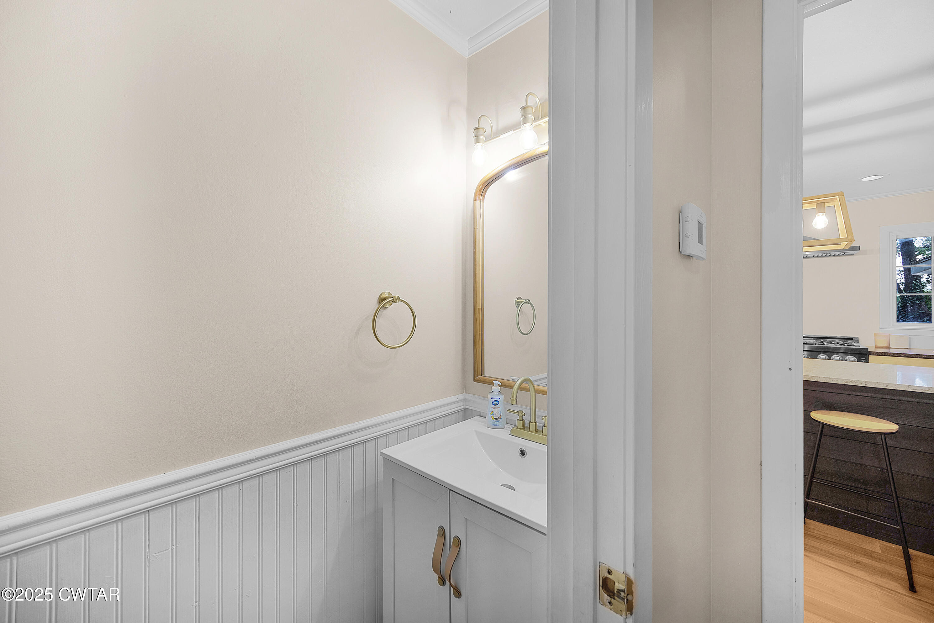 157 Mockingbird Lane Martin, TN 38237 - Photo 14 of 26 a bathroom with a sink and a mirror