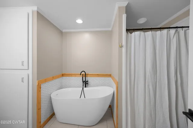 a bathroom with a sink and bathtub