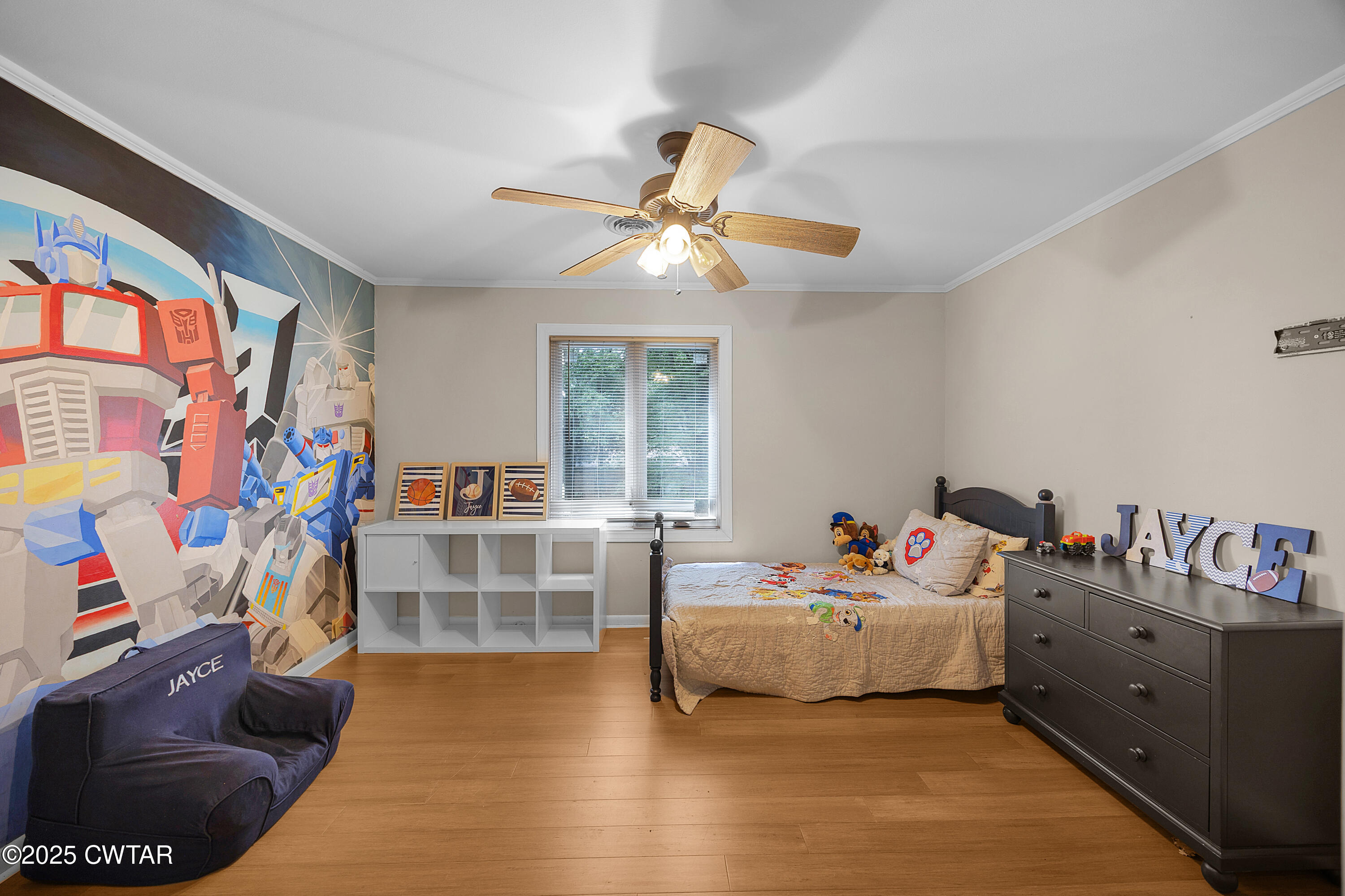 157 Mockingbird Lane Martin, TN 38237 - Photo 20 of 26 a bed room with a bed and a baby crib