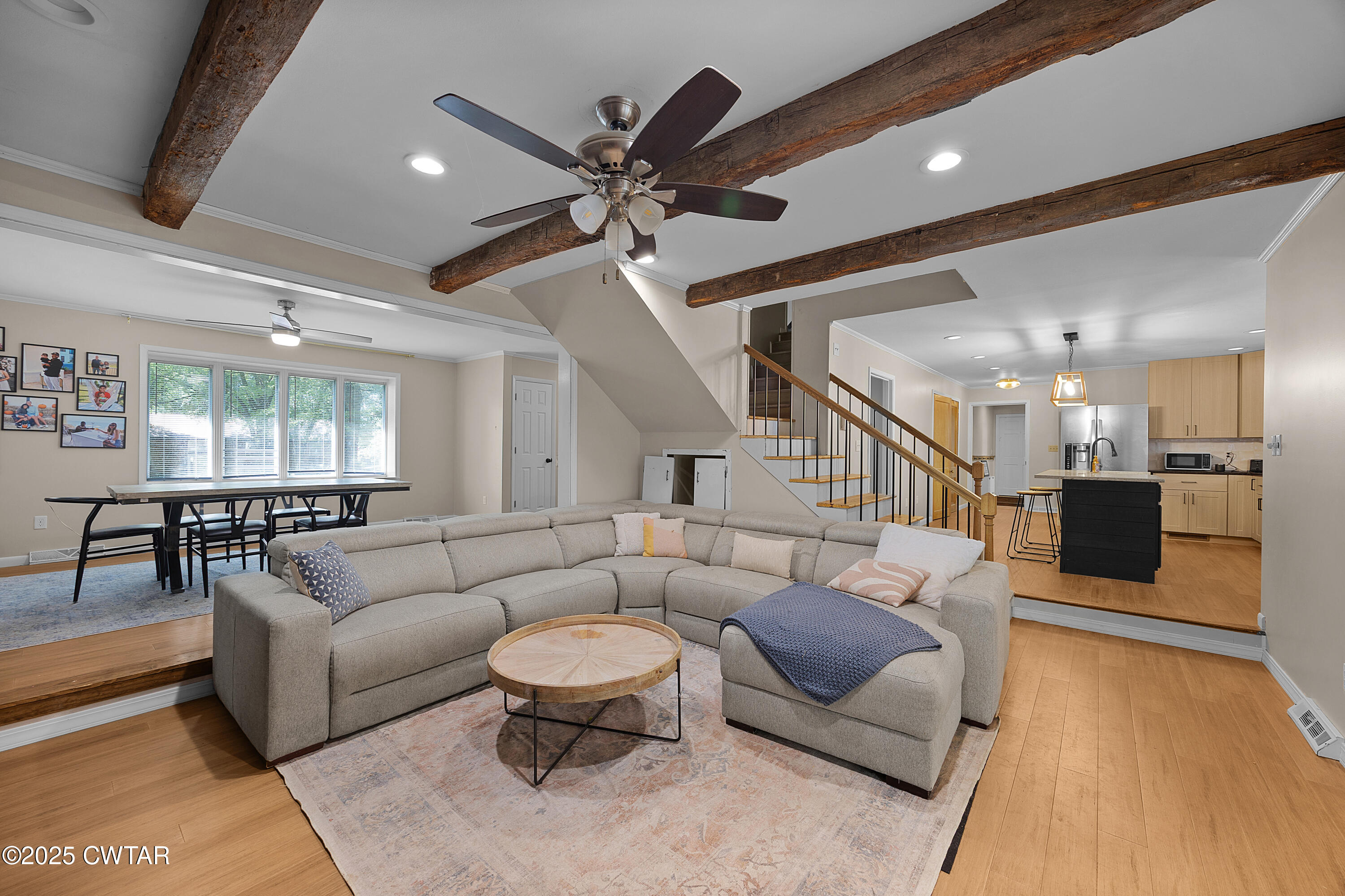 157 Mockingbird Lane Martin, TN 38237 - Photo 9 of 26 a living room with furniture and a wooden floor