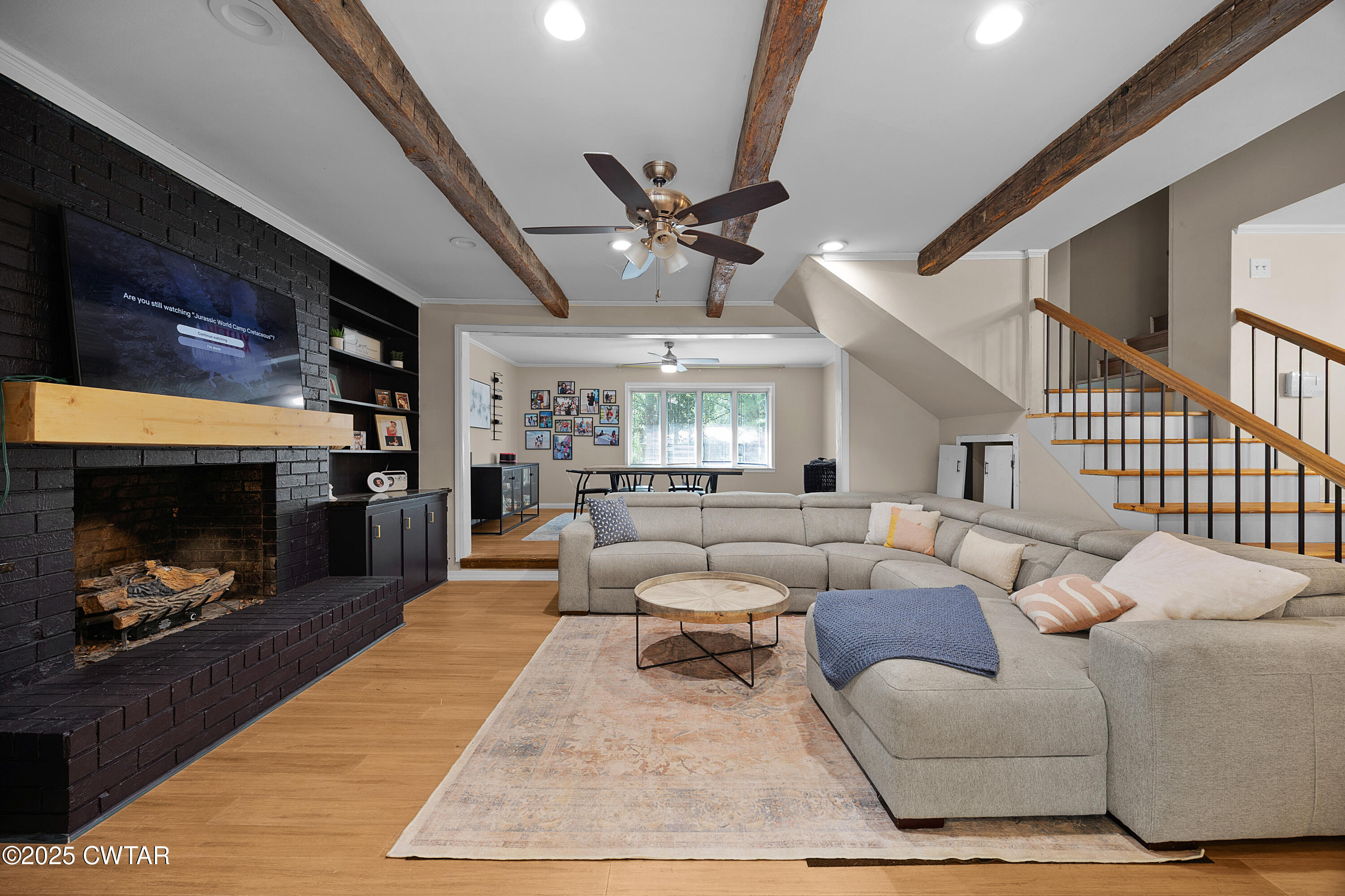 157 Mockingbird Lane Martin, TN 38237 - Photo 10 of 26 a living room with furniture and a fireplace