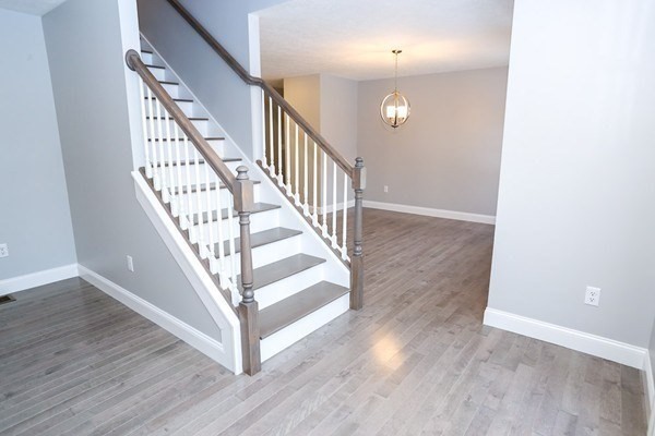 Lot 197 Stowell Road Ashburnham, MA 01430 - Photo 14 of 42 a view of staircase with wooden floor and white walls
