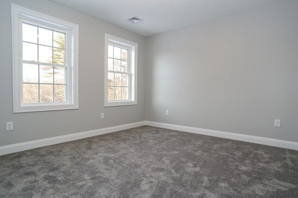 Lot 197 Stowell Road Ashburnham, MA 01430 - Photo 23 of 42 an empty room with windows