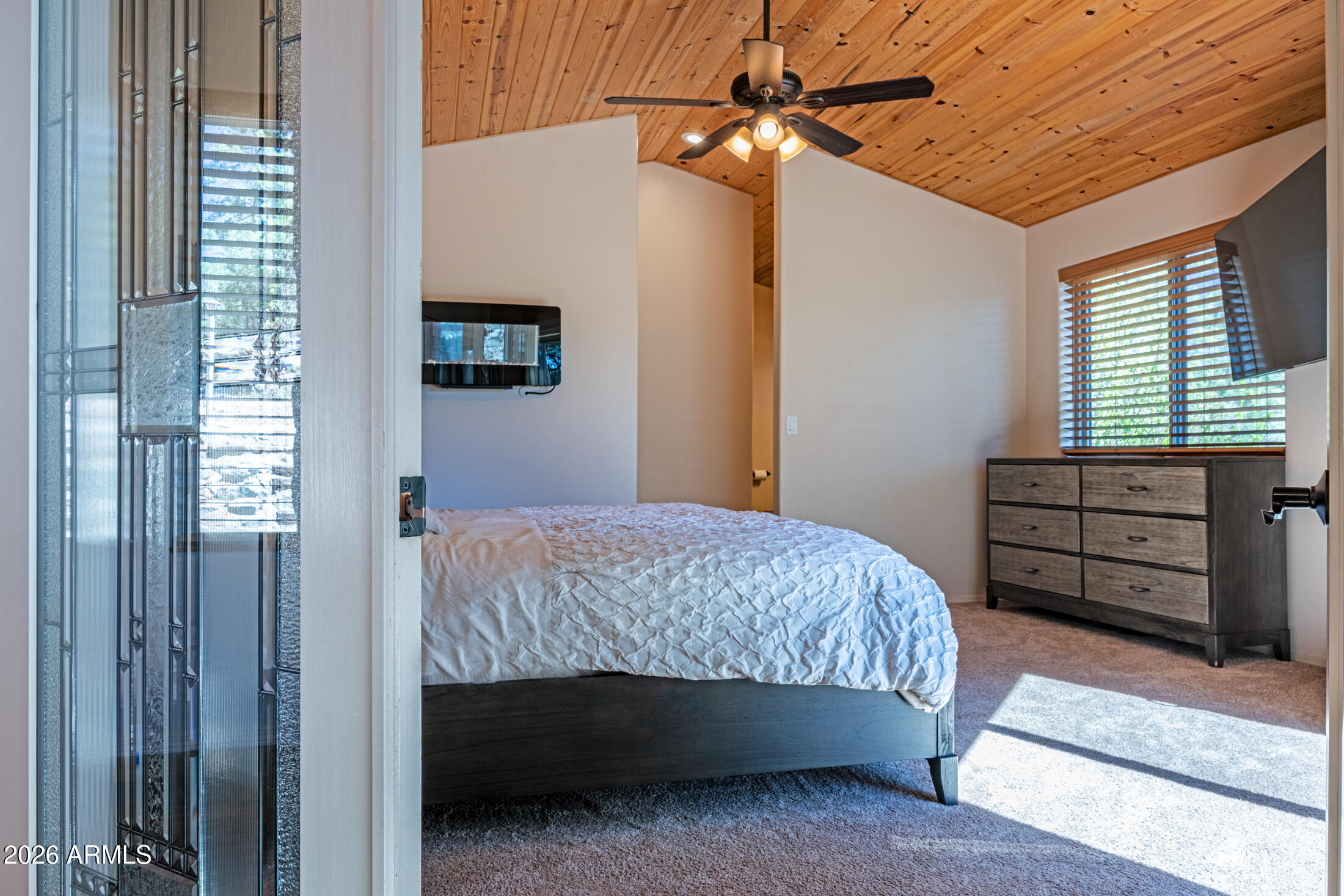 190 South Greystone Circle Payson, AZ 85541 - Photo 19 of 45 a bedroom with a bed and a window