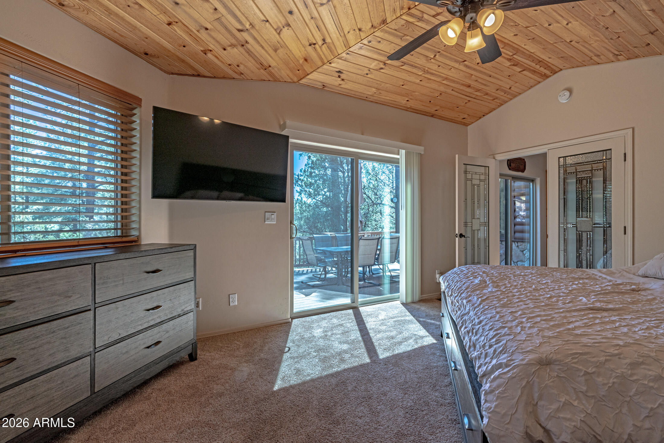 190 South Greystone Circle Payson, AZ 85541 - Photo 20 of 45 a bedroom with a bed and a flat screen tv