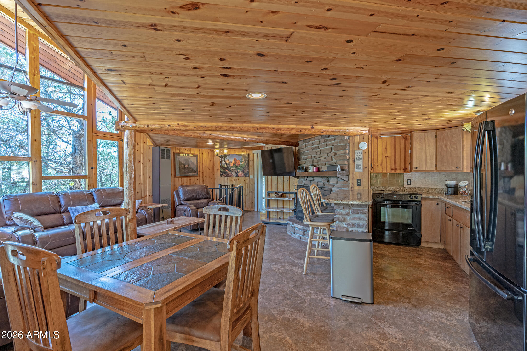 190 South Greystone Circle Payson, AZ 85541 - Photo 3 of 45 a view of a dining room with furniture window and outside view