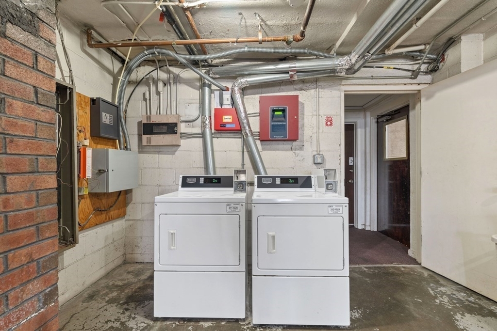 1030 Bennington Street, Unit 15 Boston, MA 02128 - Photo 10 of 12 a utility room with dryer and washer