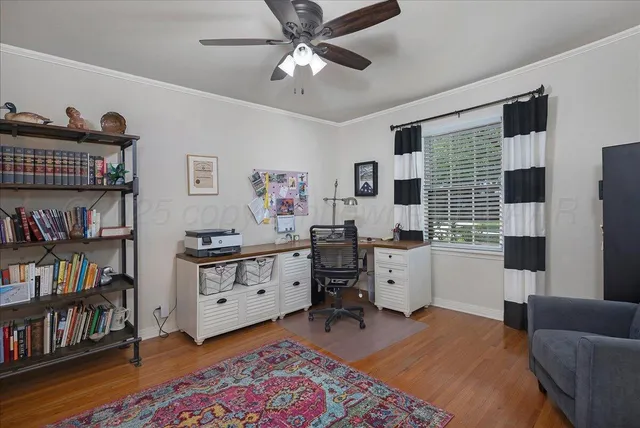 a bathroom with double vanity and a mirror