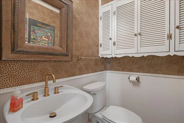 a view of a swimming pool with a yard