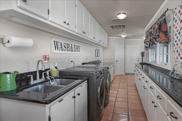 a view of a chairs and table in patio with a yard