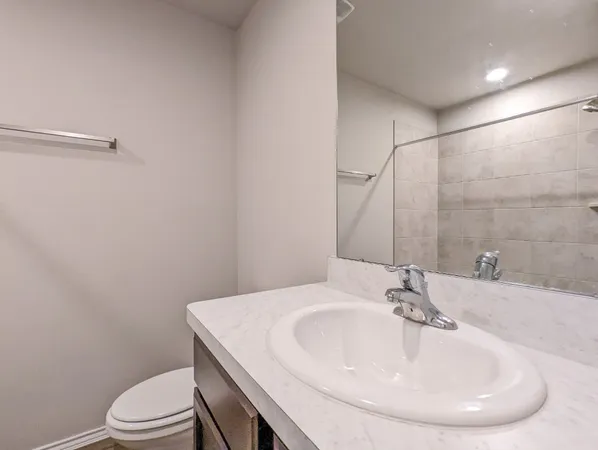 a bathroom with a sink and a toilet