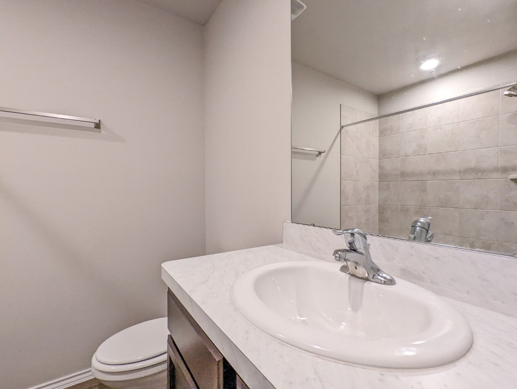 14541 Montclair Way Magnolia, TX 77354 - Photo 19 of 31 a bathroom with a sink and a toilet