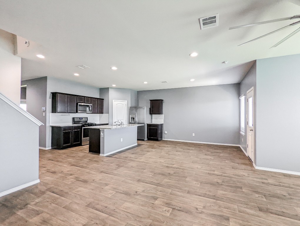 14541 Montclair Way Magnolia, TX 77354 - Photo 2 of 31 a view of kitchen with stainless steel appliances kitchen island