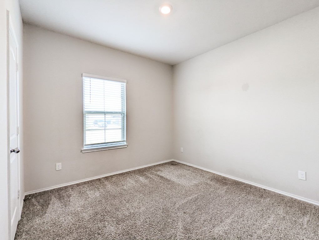 14541 Montclair Way Magnolia, TX 77354 - Photo 24 of 31 an empty room with a window