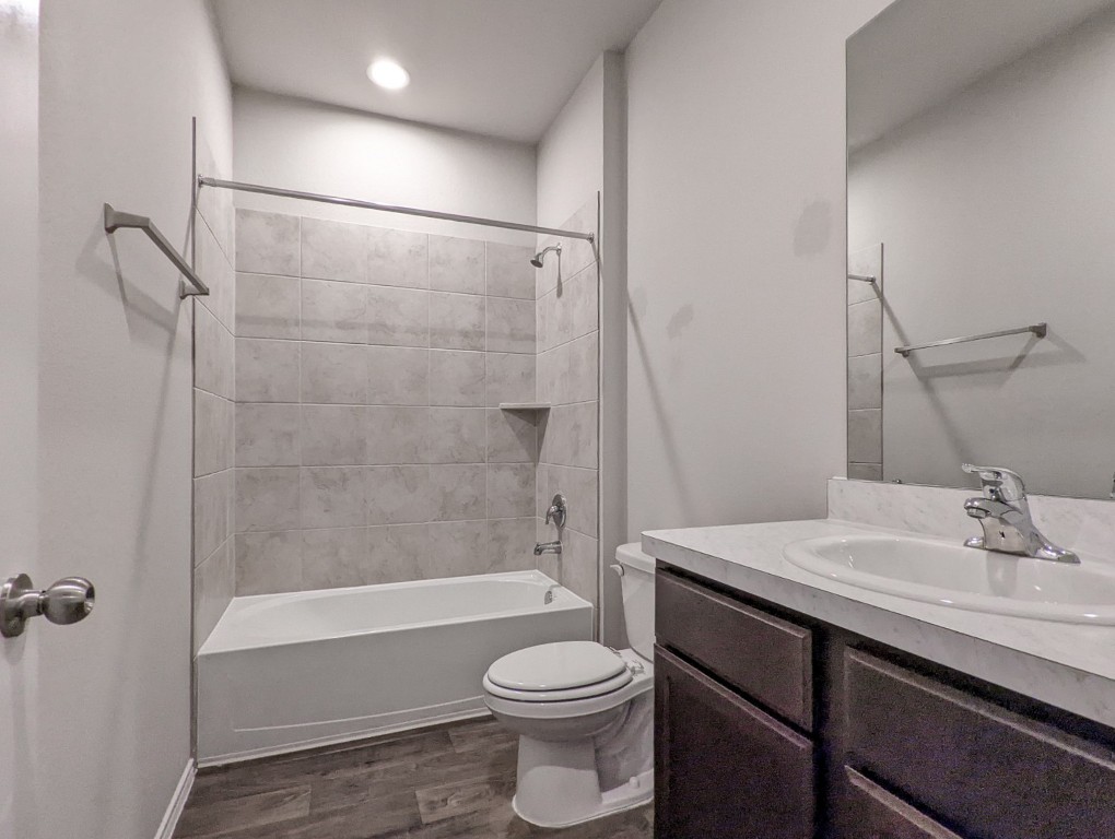 14541 Montclair Way Magnolia, TX 77354 - Photo 25 of 31 a bathroom with a sink toilet and shower