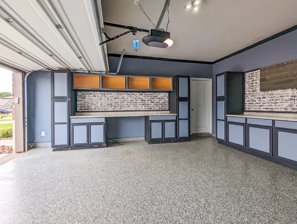 a view of a livingroom with furniture and a ceiling fan