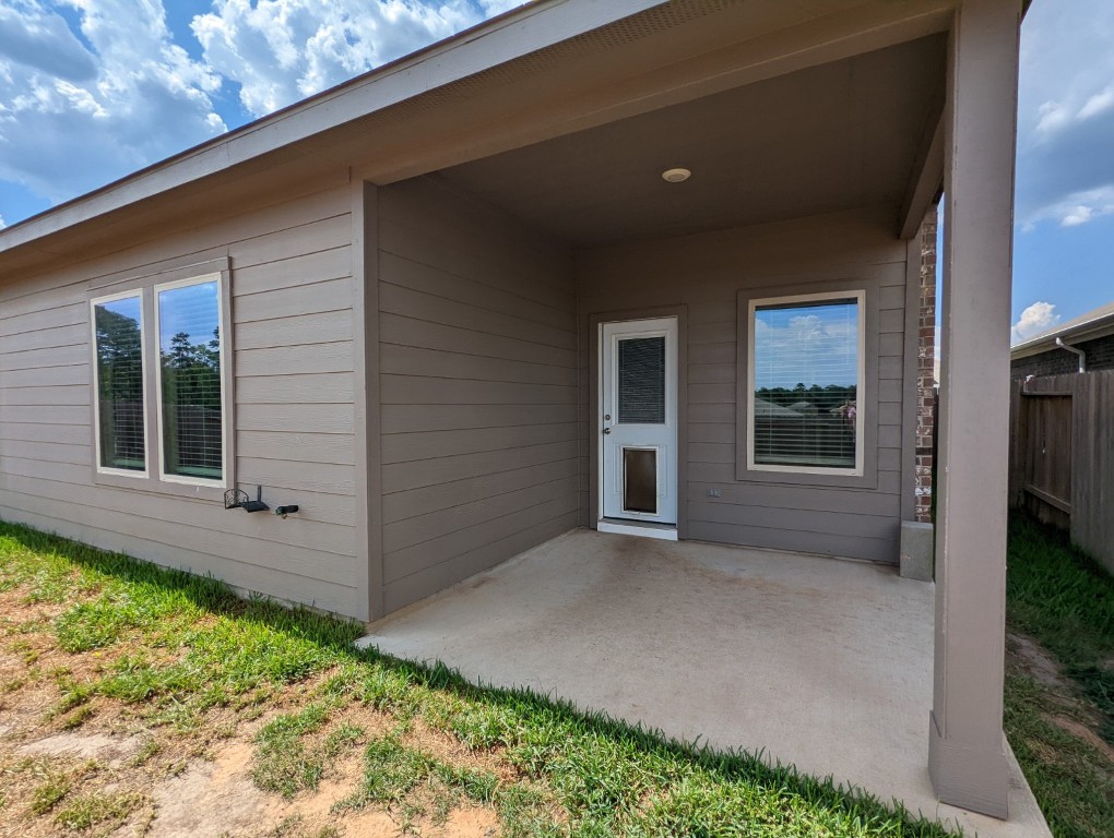 14541 Montclair Way Magnolia, TX 77354 - Photo 29 of 31 a view of a house with backyard and garden