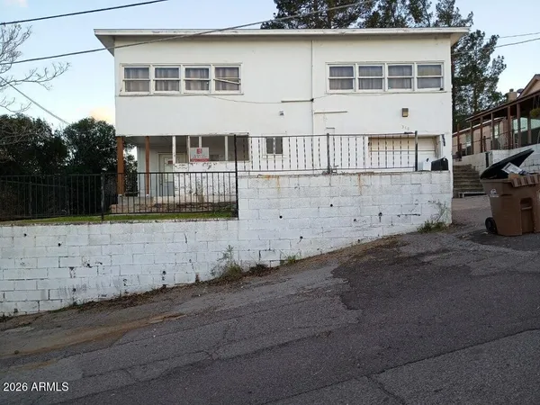 a front view of a house with a garage