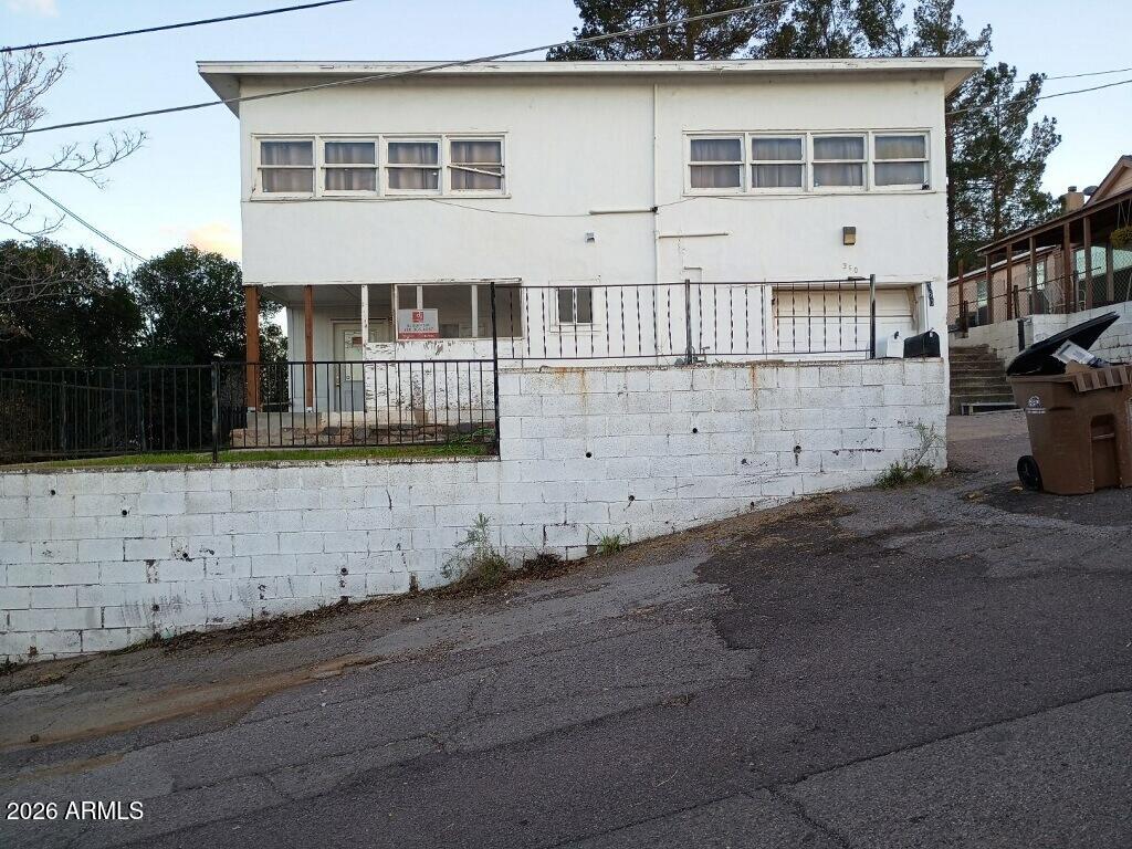 a front view of a house with a garage