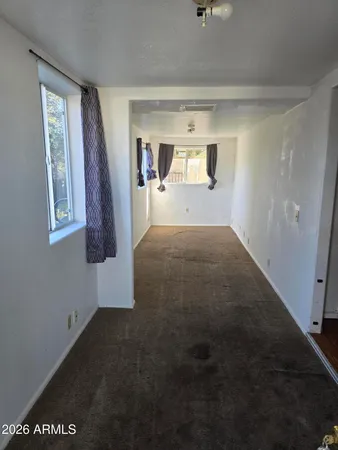 a view of empty room with front door
