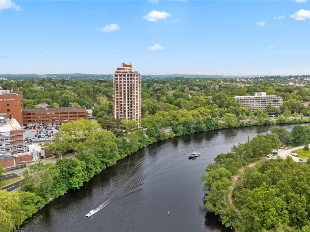 1010 Memorial Drive, Unit 6G Cambridge, MA 02138 - Photo 2 of 22 a view of a lake with a city