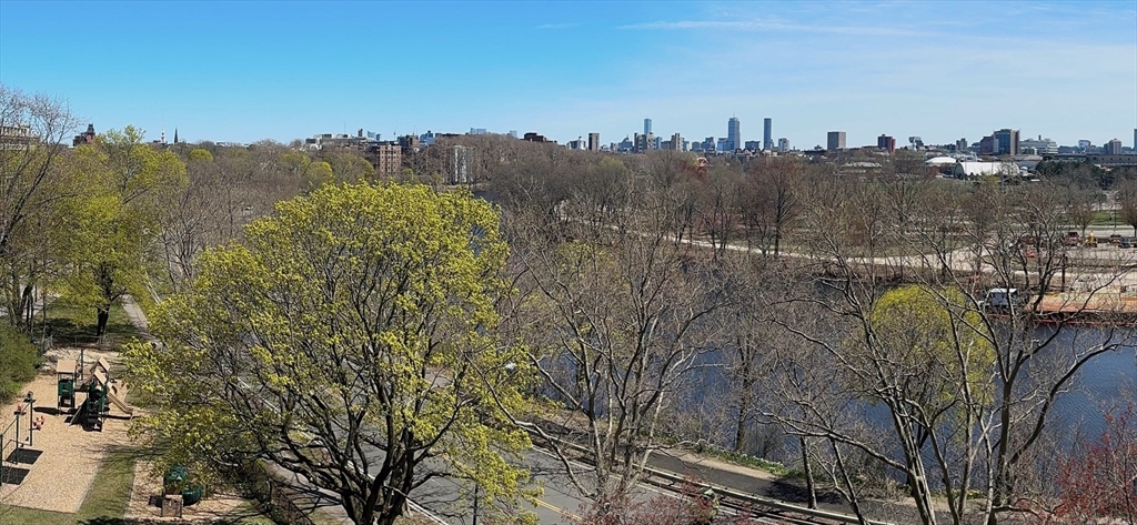1010 Memorial Drive, Unit 6G Cambridge, MA 02138 - Photo 21 of 22 an aerial view of a houses with a yard and mountain view