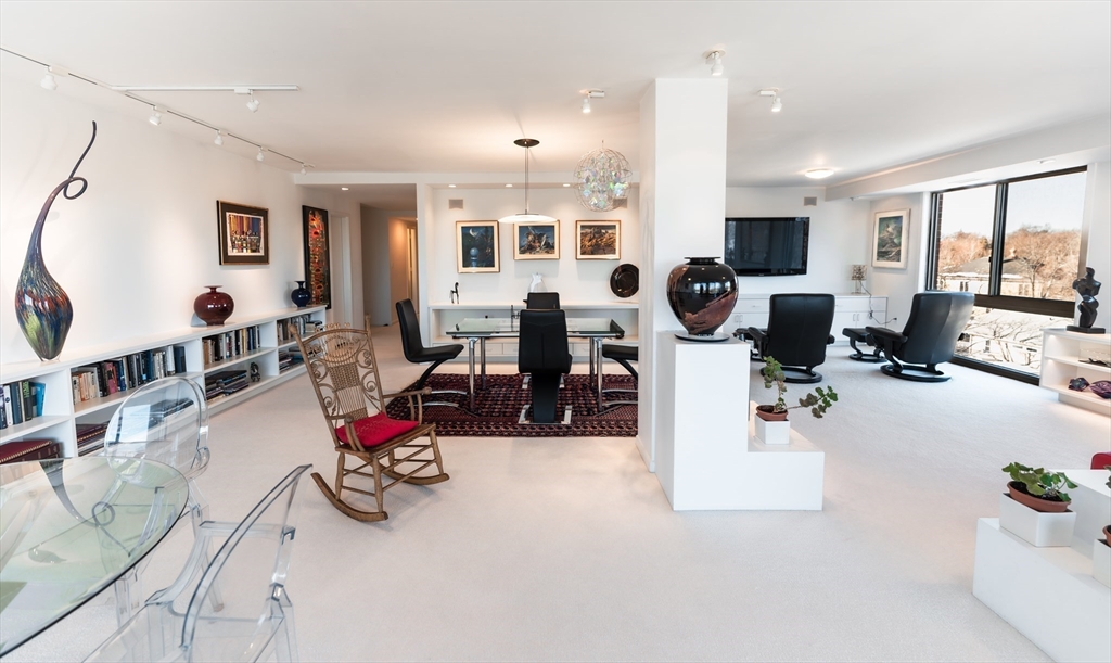 1010 Memorial Drive, Unit 6G Cambridge, MA 02138 - Photo 4 of 22 a view of living room with lots of furniture and equipment