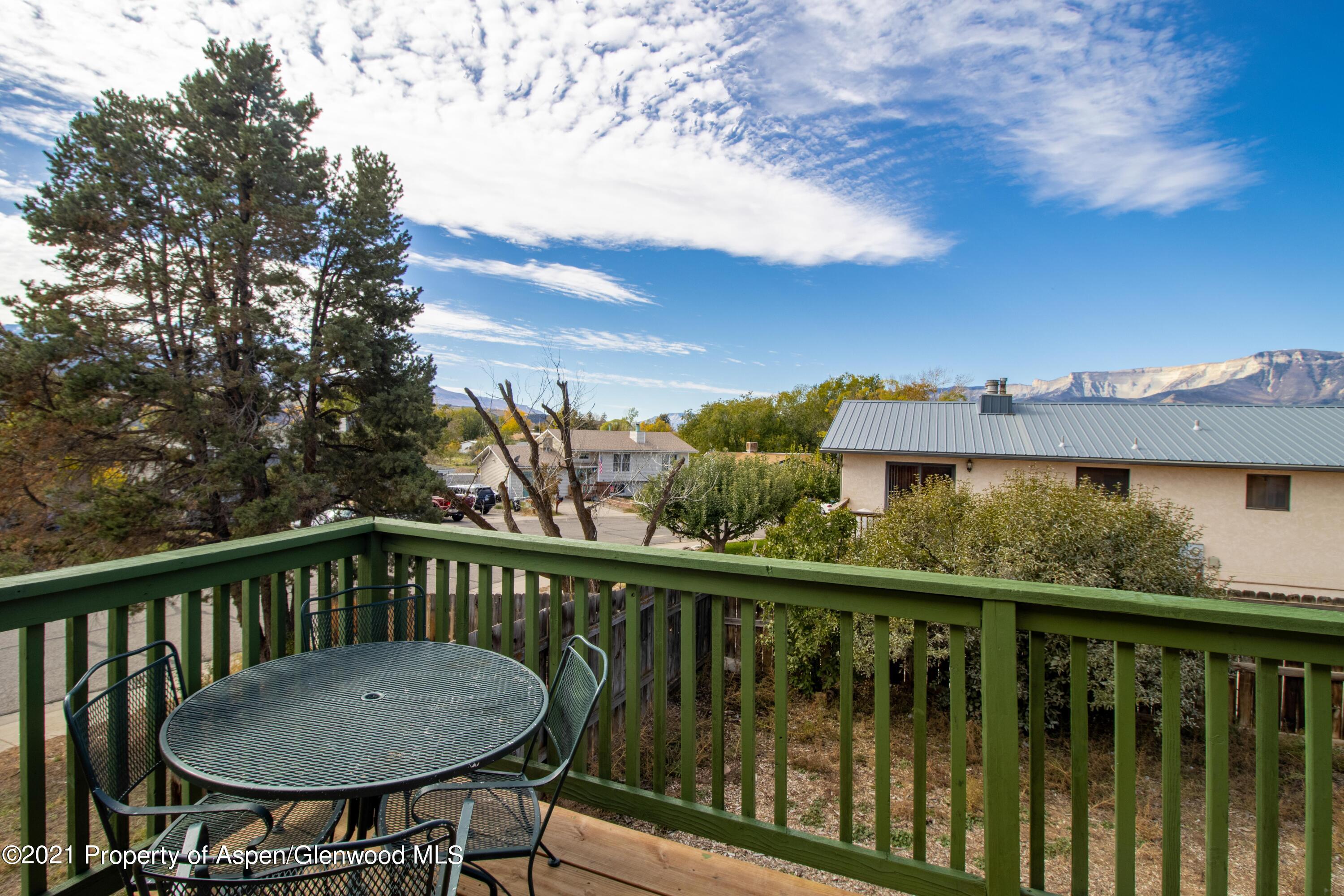 1002 Arnold Court Rifle, CO 81650 - Photo 14 of 15 a view of a balcony with an outdoor seating