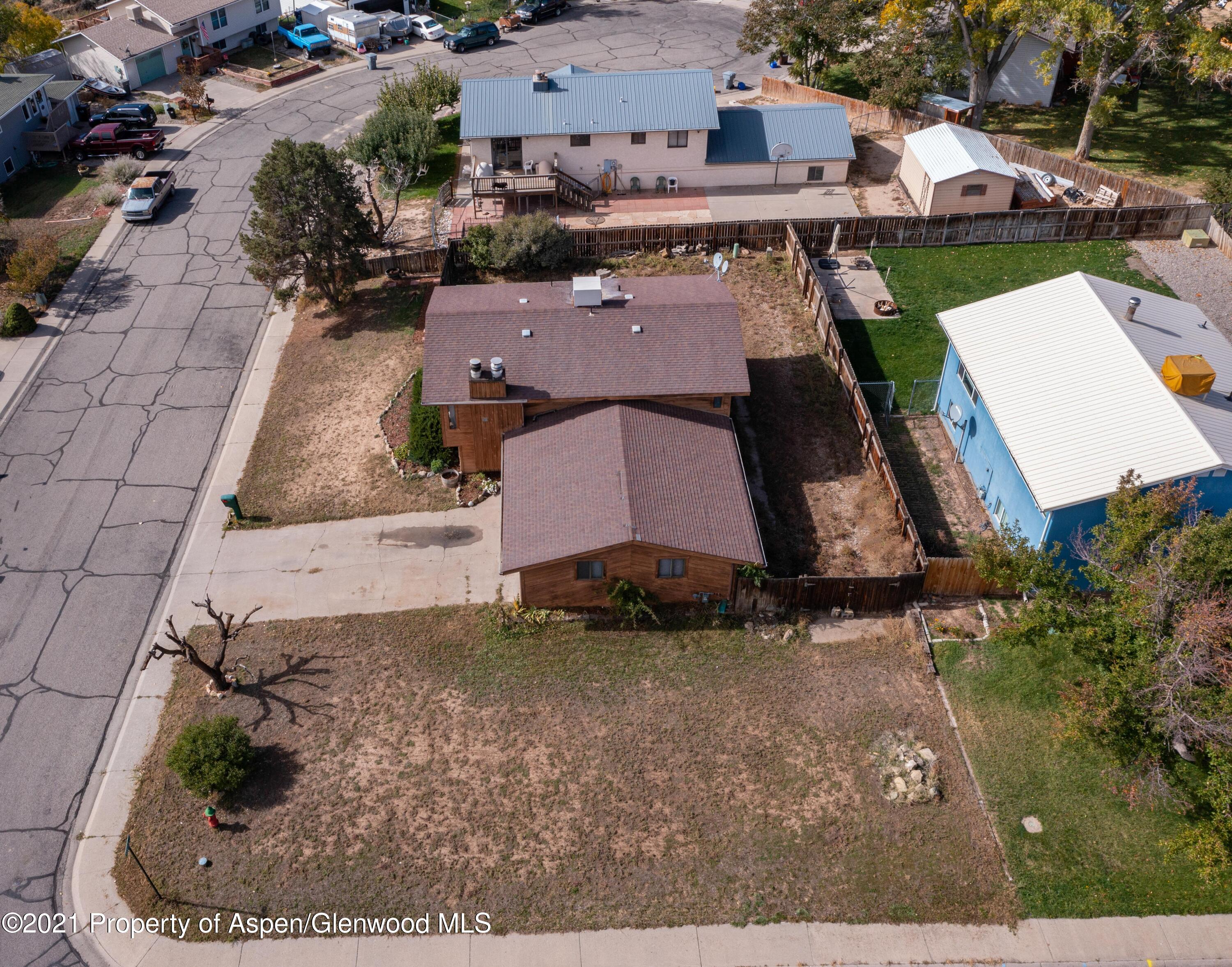 1002 Arnold Court Rifle, CO 81650 - Photo 15 of 15 an aerial view of a house with a yard